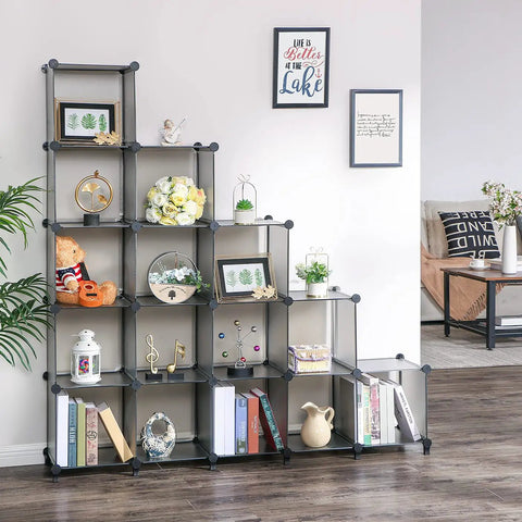 Living room with 16 cube storage organizer cubby shelving for kids toys craft supplies art projects, gray finish, assembled.