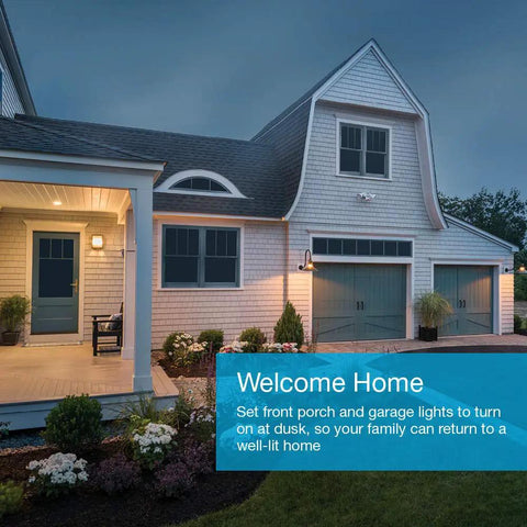 Evening view of a house with Caseta Deluxe Smart Switch Kit Make Your Lights Smart Turn Multiple Fixtures Into A Connected System.