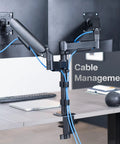 Zero Hassle Dual Monitor Mount For 17 To 32 Inch Screens With Slick Mechanical Spring Arms features cable management and dual monitor setup.