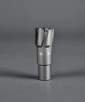 Carbide annular cutter on Weldon shank, 3/4-inch diameter, upright metal tool for drill press.