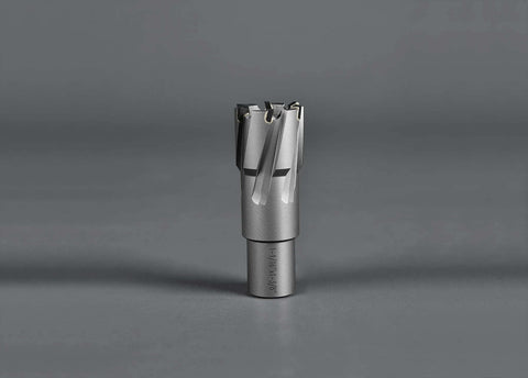 Carbide annular cutter on Weldon shank, 3/4-inch diameter, upright metal tool for drill press.