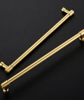 Two Pack 10 Inch Brushed Gold Cabinet Handles For Dresser And Kitchen Cabinets Premium Zinc Hardware With Modern Cupboard Door Pulls Heavy Duty Drawer Pulls Easy Install And Durable Finish. Two brushed gold cabinet handles on black background.