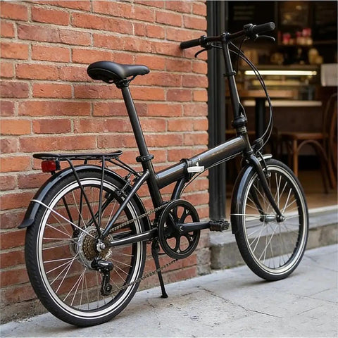 Durable Bike Crank Arm Set With 52 Tooth Chainring on city folding bicycle near brick wall