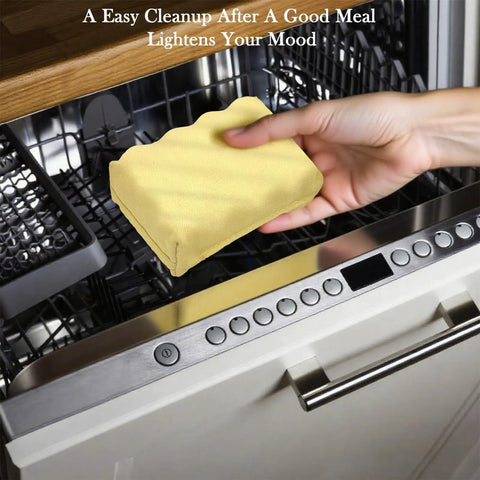 Hand holding Bristle Free Grill Brush With Scraper For Outdoor Grilling steam cleaning kit by open dishwasher.