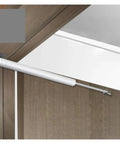 Overhead Door Closer With Soft Close Automatic Gas Spring 110 Degree Positioning installed on wooden door.
