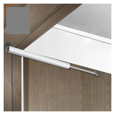 Overhead Door Closer With Soft Close Automatic Gas Spring 110 Degree Positioning installed on wooden door.