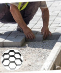 Worker using Concrete Paver Mold For Pathways And Patios Easy To Use DIY Garden Path Maker Plastic Pavement Mold Landscape Decoration