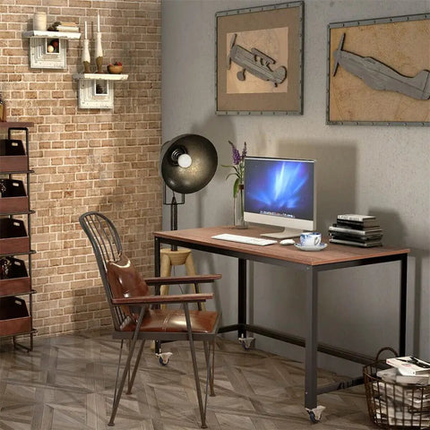Smooth Ride Rolling Computer Desk With Lockable Wheels And Heavy Duty Steel Frame Portable Laptop Workstation with brown wood top.