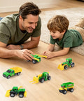 Father and son playing with Six Piece Diecast Farm Vehicle Toy Set For Kids 3 Years And Up Includes Tractor Harvester