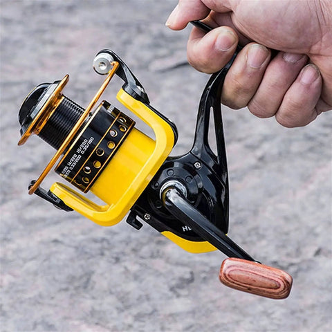 High Speed Fishing Reel With Gear Ratio Five Point Two To One Yellow Metal Casting Reel For Freshwater And Saltwater