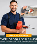 Self Feeding Drill Ready Drain Snake For Kitchen And Bath Clogs Five Zero Foot Heavy Duty Plumbing Auger With No Hand Cranking, held by a smiling man.