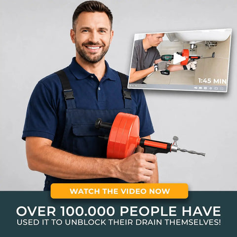 Self Feeding Drill Ready Drain Snake For Kitchen And Bath Clogs Five Zero Foot Heavy Duty Plumbing Auger With No Hand Cranking, held by a smiling man.