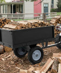 Beefy Heavy Duty Steel Dump Cart For ATVs And Tractors With Fold Down Side Panels 500 Lb Capacity Utility Trailer loaded with firewood