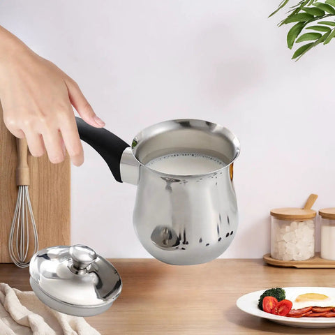 Turkish Coffee Pot And Butter Warmer Pan Stainless Steel 720ml with handle, used for coffee or melting, on kitchen counter.