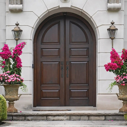 Double wooden arched doors with decorative columns, featuring Matte Black Double Door Handle Set With Heavy Duty Zinc Alloy Construction.