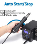 Person holding Maker Friendly Pro Grade Hot Air SMD Soldering Rework Station with Quick Change Nozzle System and Holder