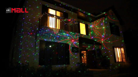 Outdoor Christmas RGB Laser Light Projector With 8 Patterns In 1 illuminating a house facade at night, garden decor