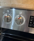 Stove Dial Stickers For Oven And Range Knobs Easy Read Knob Symbol Decals Replacement Indicator For Cooktop Up To Two Point Four Inch Three Sheets Silver Background With Black Symbols shown on stainless steel knobs.