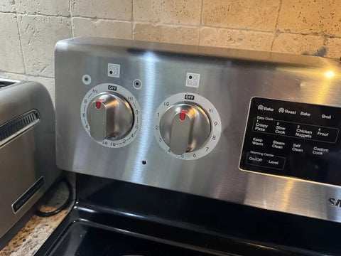 Stove Dial Stickers For Oven And Range Knobs Easy Read Knob Symbol Decals Replacement Indicator For Cooktop Up To Two Point Four Inch Three Sheets Silver Background With Black Symbols shown on stainless steel knobs.