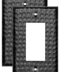 Pack of two hand hammered matte black 1 gang rocker light switch cover plates for GFCI receptacles and outlets.