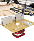 Premium Manual Router Lift System Featuring Heavy Duty Aluminum And Stainless Steel Construction For Dead Nuts Accuracy And Slick Table Operation Crafted For Hardcore DIY Woodshop Upgrades, showing golden routing plate and red base.