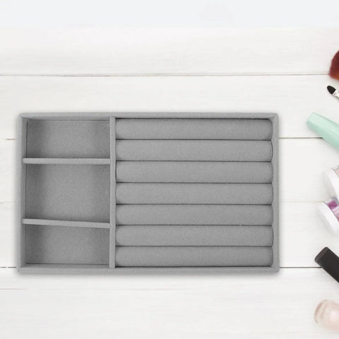 Slick Velvet Jewelry Tray With Anti Scratch Compartments For Rings And Bracelets Includes Dual Grid Foam Inserts on a wooden surface.