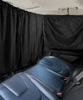 Set Of 3 Car Window Shades With Privacy Divider And Side Window Covers For Kids And Babies Travel In SUVs And Sedans, 95 Percent Light Blocking Sunshades showing rear divider installed in car.
