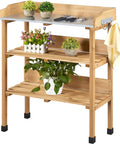 Outdoor Garden Potting Bench With Metal Top Storage Shelf And Three Hooks Durable Fir Wood Workstation displayed with plants and tools