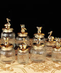 Dead Legit Glass Kitchen Storage Jars With Snap On Lids, assorted sizes, clear glass, decorative animal topped lids.