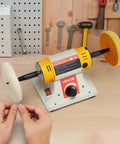Benchtop Buffer Polisher With Half Horsepower Motor And 0 To 8000 RPM Adjustable Speed Heavy Duty Polish And Buffing Machine Includes 4 Inch Cotton Wheel Pair 3 Inch Fiber Wheels And Polishing Compound For Metal Jewelry And Wood in a workshop setting.