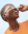 Person wearing Z87.1 Certified Safety Glasses With Polycarbonate Lenses That Block Blue Light And UV, Scratch And Shatter Proof eyewear
