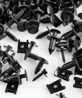 Assorted components from 120 Go-To M4.2 Universal Fender Liner Kit with hex head screws, U nuts, nylon bumper fasteners, plastic clips visible