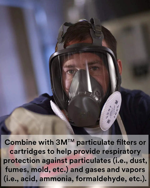 Person wearing Reusable Full Face Mask Respirator For Vapors And Particles Grey Medium Size with filters attached.