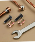 Close-up of Metal Threaded Wood Inserts Kit with bolts, hex wrenches, and drill bit for flush furniture fasteners connectors