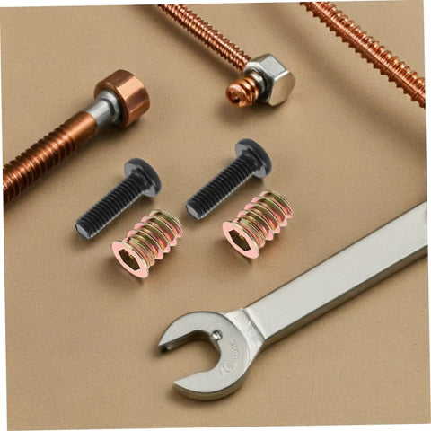 Close-up of Metal Threaded Wood Inserts Kit with bolts, hex wrenches, and drill bit for flush furniture fasteners connectors