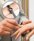 Ring Sizer With Magnifier For Easy Size Reading Clear Lens Ring Measurer 1 Through 17 Reusable Plastic Ring Sizer Kit Simple To Use Accurate DIY Jewelry Tool For Quick No Guess Sizing being used to measure a finger size.