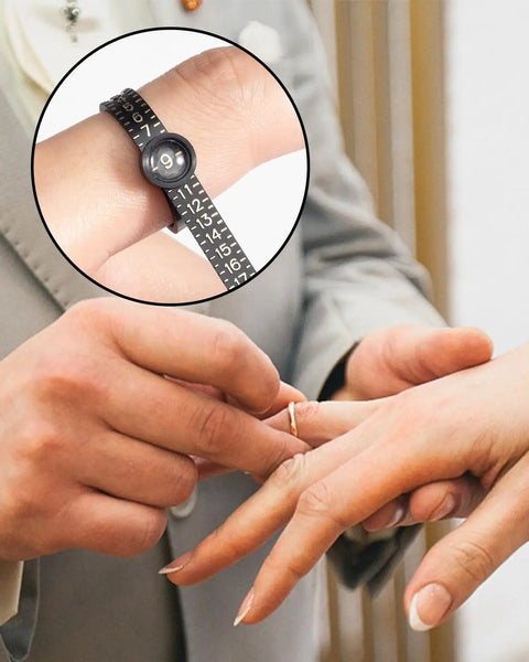 Ring Sizer With Magnifier For Easy Size Reading Clear Lens Ring Measurer 1 Through 17 Reusable Plastic Ring Sizer Kit Simple To Use Accurate DIY Jewelry Tool For Quick No Guess Sizing being used to measure a finger size.