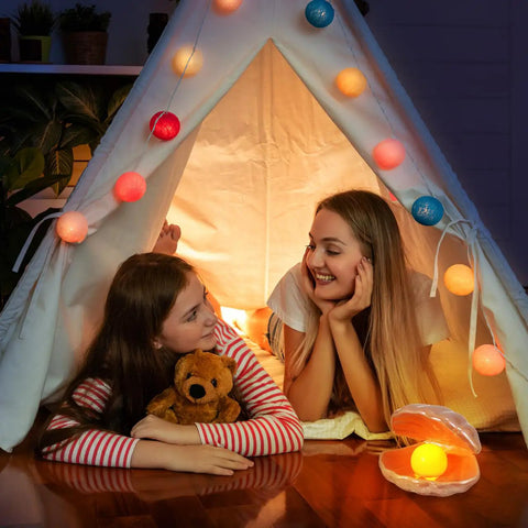 Girls in a tent with Seashell LED Mood Lamp, Portable Pearl Night Light, Ceramic Seashell Desk Ornament, cozy glow ambiance
