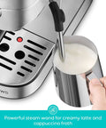 Compact 20 Bar Espresso Machine With Steam Milk Frother for Home Barista Vibes showing frothing milk in a jug, stainless steel design.