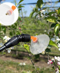 Electric Drift Guard Spray Nozzle With Transparent Windproof Shield for flat misting and precise crop spraying on plants.