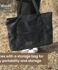 Portable Camping Fire Pit With Grill For Cooking, Outdoor Stove With Storage Bag shown carried on grassy background