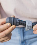 Hands holding Five Eighth Inch Hose End Repair Kit for Garden Hose Fittings, Leak Repair Set With Secure Power Grip Connector