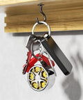 Hella Handy Keychain Tape Measure Boasting A Durable Steel Ruler Track And Totally Sick Wheel Hub Design For Pocket Ready Convenience When You Gotta Take Quick Measurements Right Now hanging with keys on hook