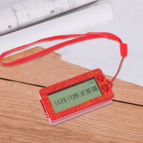 Red handheld device for generating random numbers, shown on a wooden table with a clear digital display.