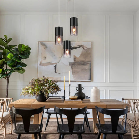 Black Industrial Kitchen Island Pendant Light With Black Glass Shade 3 E26 Bulbs and 59 Inch Adjustable Cord in dining room.