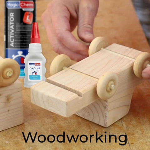 Hand gluing wooden toy car with Beast Mode Power Bond Cyanoacrylate Glue With Activator Kit, featuring glue and activator bottles.