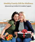 Two women smiling, one holding orange flowers and the other holding a gift box labeled 'Air Compression Leg Massager Boots For Circulation'.