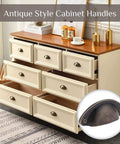 Antique Bronze Shell Cup Pulls Set Of 10 For Cabinets And Dressers with screws, vintage style zinc alloy hardware on white drawers.