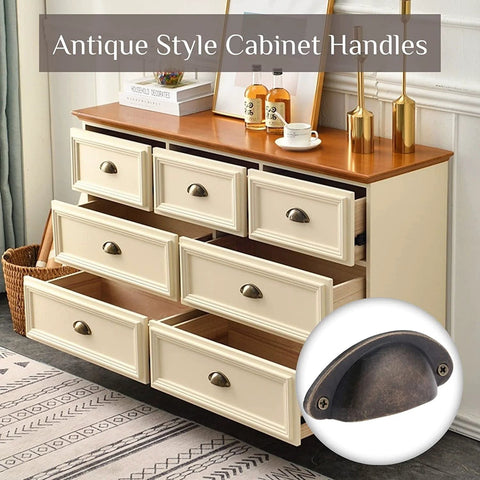 Antique Bronze Shell Cup Pulls Set Of 10 For Cabinets And Dressers with screws, vintage style zinc alloy hardware on white drawers.