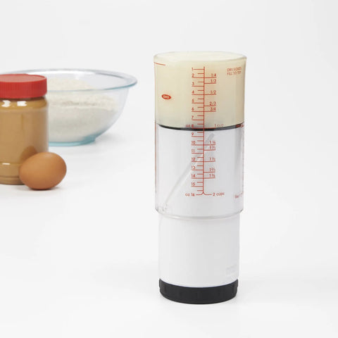 Two Cup Adjustable Measuring Cup With Grippy Rotating Body For Easy Pouring Of Peanut Butter And Honey, Inner Track Guides The Plunger